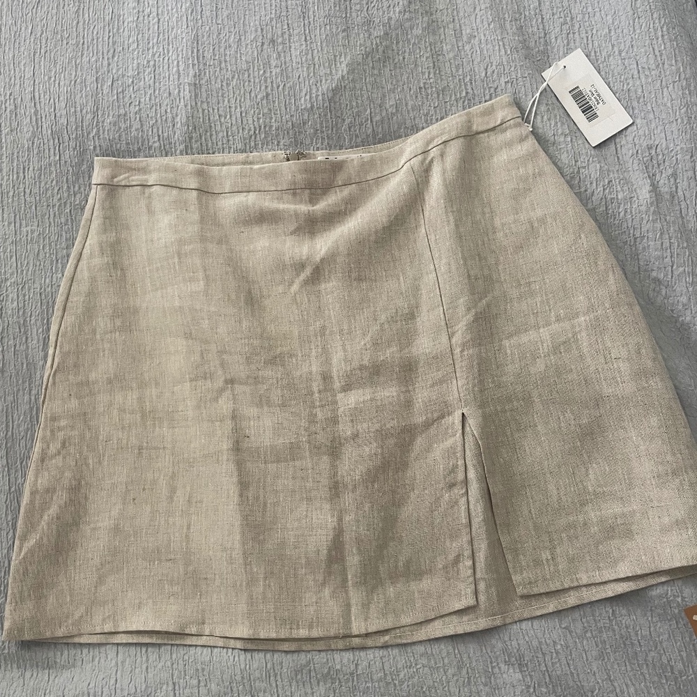 Reformation beige colored mini skirt